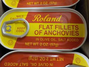 lot 344 image: 50 -2 oz Tins Roland Flat Fillets of Anchovies best date 082023