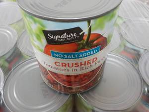lot 389 image: 12 - 28 oz cans Signature Crushed Tomatoes - no salt added