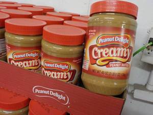 lot 398 image: 6 - 40 oz Jars Peanut Delight Peanut Butter best date 082023