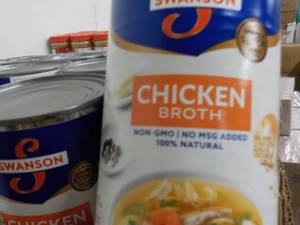 lot 422 image: 24 cans Swansons Chicken Broth...