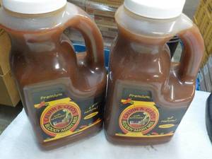 lot 455 image: 2 Jugs Calvin and Cleos Bloody Mary Mix