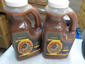 lot 456 image: 2 Jugs Calvin and Cleos Bloody Mary Mix