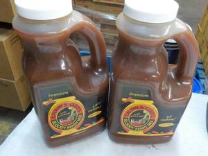 lot 457 image: 2 Jugs Calvin and Cleos Bloody Mary Mix