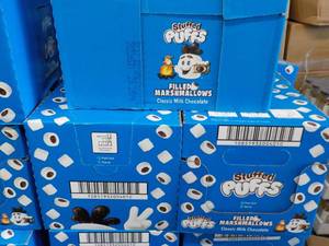 lot 509 image: 3 boxes Stuffed Puffs Milk Chocolate Filled Marshmallows Best By 05212022