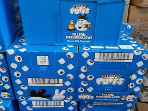 lot 510 image: 3 boxes Stuffed Puffs Milk Chocolate Filled Marshmallows Best By 05212022