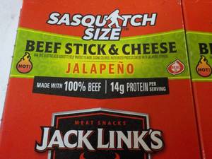 lot 535 image: 2 boxes Jack Links Sasquatch Size Beef Stick and Cheese with Jalapeno Snacks - 12 in each box