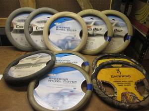 lot 59 image: (JJ) 10 Assorted Steering Wheel Covers