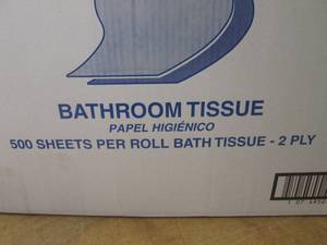 lot 92 image: (KK) Case of 96 Rolls 2-Ply Bathroom Tissue - Looks like it is missing a couple rolls.