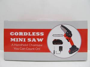 lot 51 image: Brand New Cordless Mini Saw