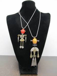 lot 94 image: 2 Large Robot Nation Pendant Necklaces by Alchemy