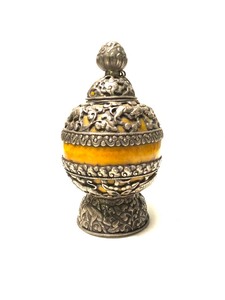 lot 123 image: Antique Tibetan Silver Urn on Amber 