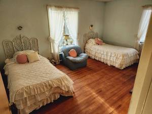 lot 112 image: Pair of Rattan Twin Beds