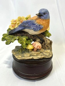 lot 31 image: Vintage Woodland Melodies You Light up My Life Music Box (5 Tall) in Working Condition