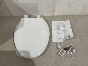 lot 448 image: cCBELLA White Elongated Toilet Seat with Pink Built in Toddler Seat