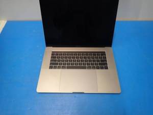 lot 58 image: Apple&nbspMacBookPro14,3 A1707 MPTR2LLA &nbspINTEL(R) CORE(TM) I7-7700HQ CPU  2.80GHZ  16GB DDR4 SDRAM  251GB SSD  15 screen with 3360 x 2100 Resolution  Includes IOS and Charger