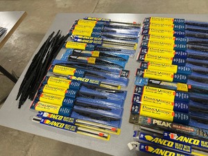 TABLE FULL OF ASSORTED WIPER BLADES