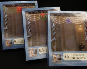 lot 4 image: TRIO OF HOLOGRAPHIC SWAGS  THAT LIGHT UP