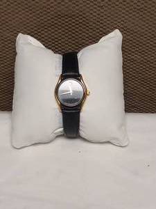 MAVADO BLACK WOMENS WATCH WITH GOLD TRIM