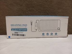 NEW ELECTRIC HEATING PAD
