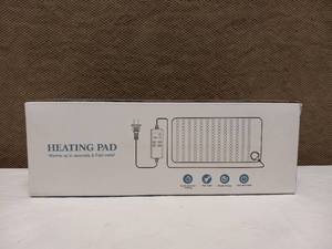 NEW ELECTRIC HEATING PAD