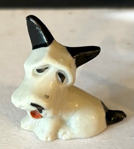 lot 97 image: Two Darling Dog Figurines