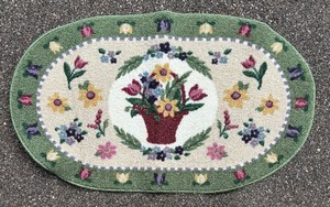 lot 305 image: Pair of Oval Floral Rugs
