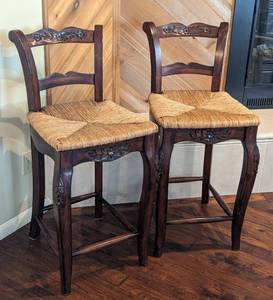 lot 8 image: Pair of Carved Wood and Rush Seat Counter Height Stools