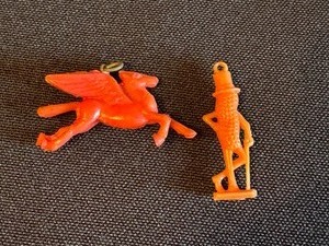 lot 22 image: Miniature Vintage Pegasus and Mr. Peanut Plastic Charms