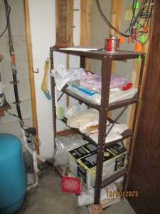 Metal storage shelf with all conten...