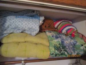 Bundle of assorted afghans and othe...