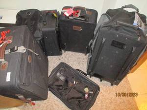 Nice collection of rolling suitcase...