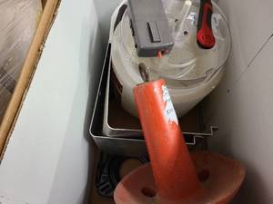 Tote of fishing gear and other items