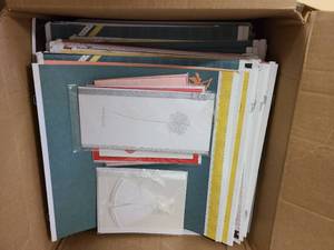 Box of scrapbooking materials