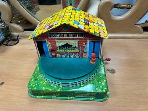lot 49 image: Vintage Farmer in the Dell Metal Toy