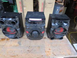 lot 2 image: LG Mini Hi-Fi System (CM4360) and LG Speakers (CMS4360F)