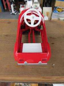 lot 49 image: 1955 Red Champion Pedal Car By Hallmark
