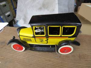 lot 65 image: Paya Tin Car 1930 Taxi