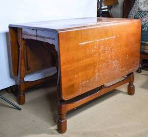 lot 85 image: Double Drop Leaf Wooden Dining Table