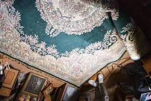 lot 68 image: Large Chinese Inspired Green Fringe Rug