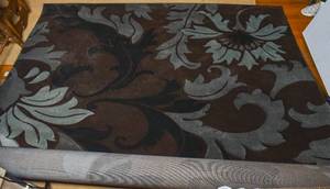 lot 133 image: Large Brown, Black, and Blue Floral Pile Rug from United Weavers