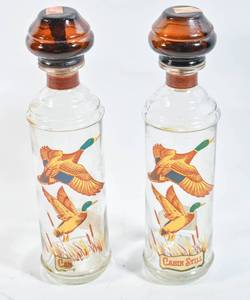 lot 166 image: Pair of Cabin Still Whiskey Bottles with Duck Decoration