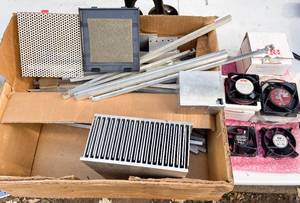 lot 554 image: Box of Parts Computer Fans, Aluminum Heat Sinks, Large Variety of Other Milled Aluminum Parts