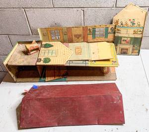lot 720 image: Vintage Tin Mickey Mouse Doll House