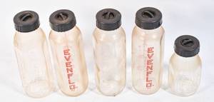 lot 192 image: 5 Vintage EvenFlo & Pyrex Glass Baby Bottles