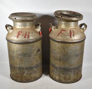 lot 449 image: Two Milk Cans