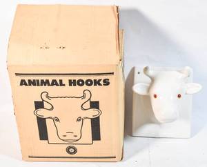 lot 222 image: Vintage Marsh Industries White Ceramic Cow Apron Hook Wall Mounted
