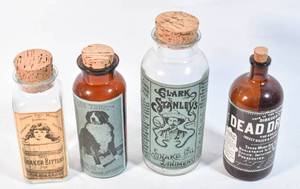 lot 226 image: 4 Vintage Style Glass Medicine Bottles