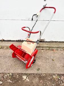 lot 513 image: Toro Snow Pup Electric Snowblower c. 1960s