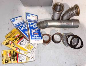 lot 743 image: Box of Pipe Heating Cords and Stainless Steel Exhaust Bellows with Other Exhaust Components