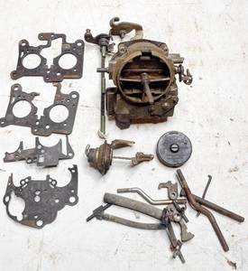 lot 742 image: Bucket of GM Rochester 2 Jet Carburetor Components